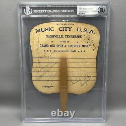 Grand Ole Opry Autograph Fan SIGNÉ Johnny Cash June Carter Cash +5 BAS RARE	<br/>
 	<br/>Note: 'Grand Ole Opry' is a famous country music stage in Nashville, Tennessee. 'Autograph Fan' refers to a fan or collector of autographs. 'SIGNED' indicates that the autographs of Johnny Cash, June Carter Cash, and five others are included. 'BAS' stands for Beckett Authentication Services, a company that authenticates autographed memorabilia. 'RARE' emphasizes the rarity of this item.