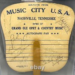 Grand Ole Opry Autograph Fan SIGNÉ Johnny Cash June Carter Cash +5 BAS RARE<br/>

 <br/>Note: 'Grand Ole Opry' is a famous country music stage in Nashville, Tennessee. 'Autograph Fan' refers to a fan or collector of autographs. 'SIGNED' indicates that the autographs of Johnny Cash, June Carter Cash, and five others are included. 'BAS' stands for Beckett Authentication Services, a company that authenticates autographed memorabilia. 'RARE' emphasizes the rarity of this item.