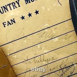 Grand Ole Opry Autograph Fan SIGNÉ Johnny Cash June Carter Cash +5 BAS RARE 
 <br/>  	  

<br/> 
Note: 'Grand Ole Opry' is a famous country music stage in Nashville, Tennessee. 'Autograph Fan' refers to a fan or collector of autographs. 'SIGNED' indicates that the autographs of Johnny Cash, June Carter Cash, and five others are included. 'BAS' stands for Beckett Authentication Services, a company that authenticates autographed memorabilia. 'RARE' emphasizes the rarity of this item.