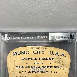 Grand Ole Opry Autograph Fan SIGNÉ Johnny Cash June Carter Cash +5 BAS RARE	
<br/>

 
<br/>
Note: 'Grand Ole Opry' is a famous country music stage in Nashville, Tennessee. 'Autograph Fan' refers to a fan or collector of autographs. 'SIGNED' indicates that the autographs of Johnny Cash, June Carter Cash, and five others are included. 'BAS' stands for Beckett Authentication Services, a company that authenticates autographed memorabilia. 'RARE' emphasizes the rarity of this item.