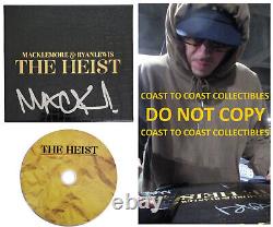 Macklemore a signé l'album The Heist en édition deluxe, coffret CD avec une preuve exacte de l'autographe.