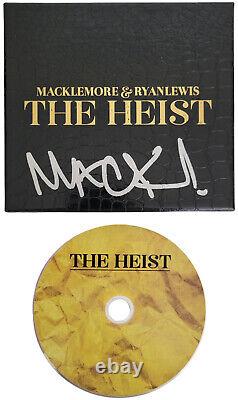 Macklemore a signé l'album The Heist en édition deluxe, coffret CD avec une preuve exacte de l'autographe.