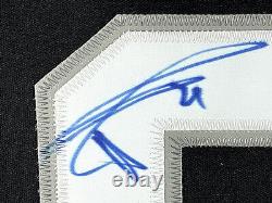 Maillot des San Antonio Spurs signé et autographié par Tim Duncan, encadré de luxe avec certification PSA.