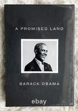 Président Barack Obama a signé le livre 'Une terre promise' en édition de luxe avec une dédicace.